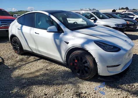 2022 Tesla Model Y из США, поврежденный, VIN 7SAYGDEE8NF360929